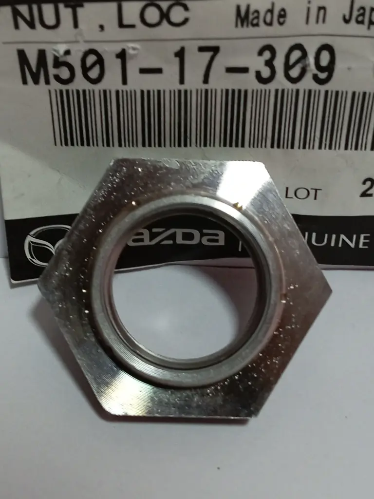 TUERCA CAJA EJE MASA B2000 B2200 B2600 88-07 BT-50 08-16